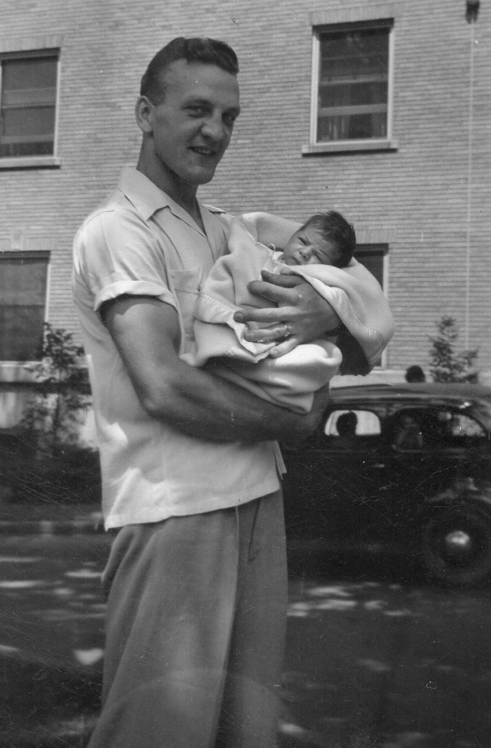 A person holding a baby